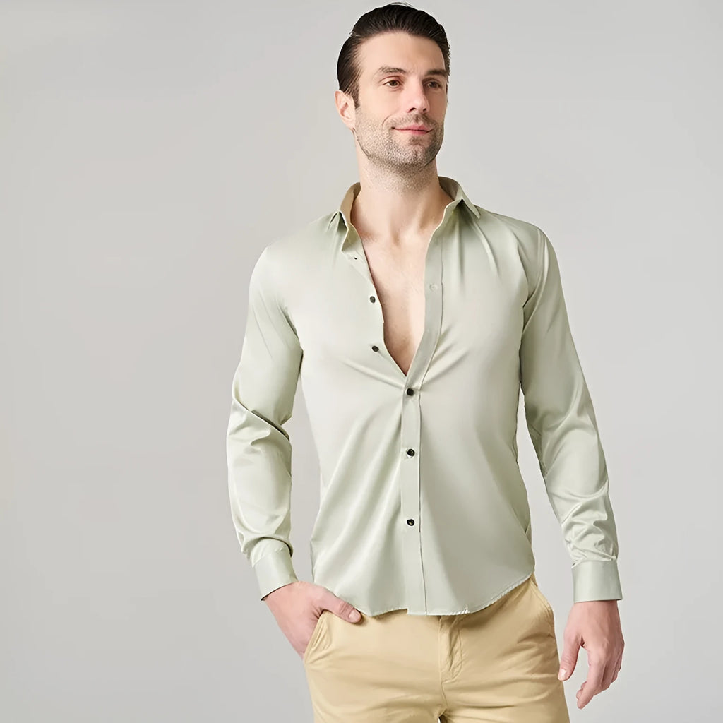 Men's long sleeve stretch work shirt in polyester fabric on a hanger.