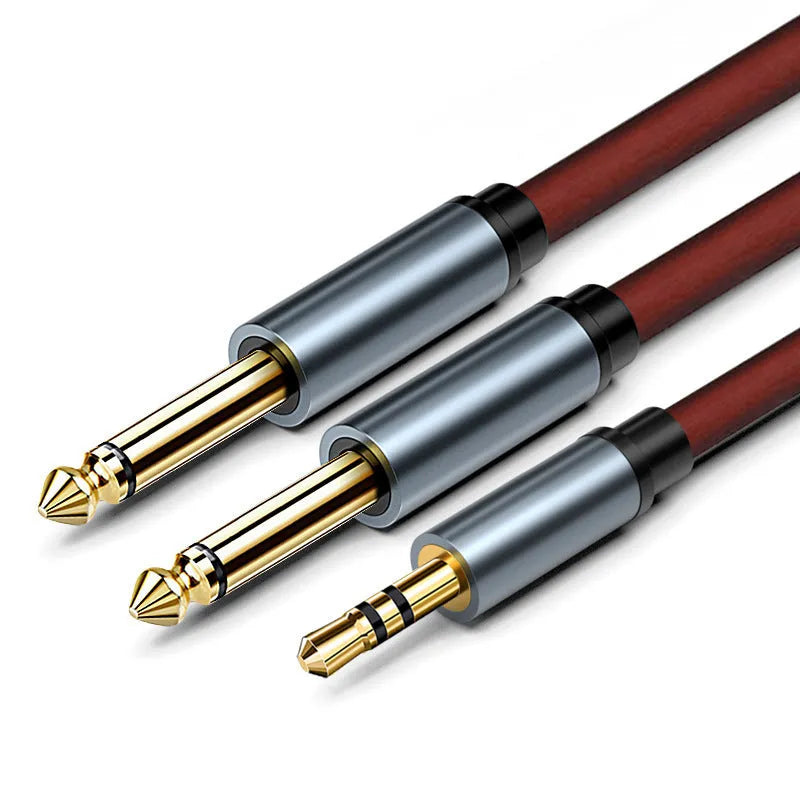 Black 3.5mm to 6.35mm stereo audio cable with gold-plated connectors on a white background