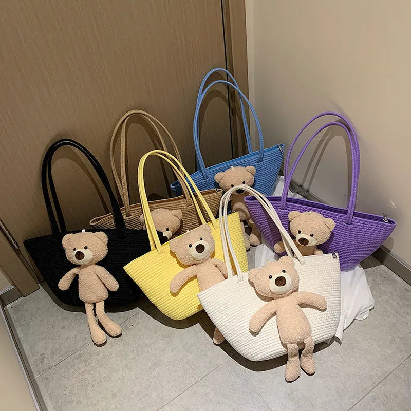 Cotton and linen woven bag with dumpling shape, double shoulder straps, and three-dimensional pocket