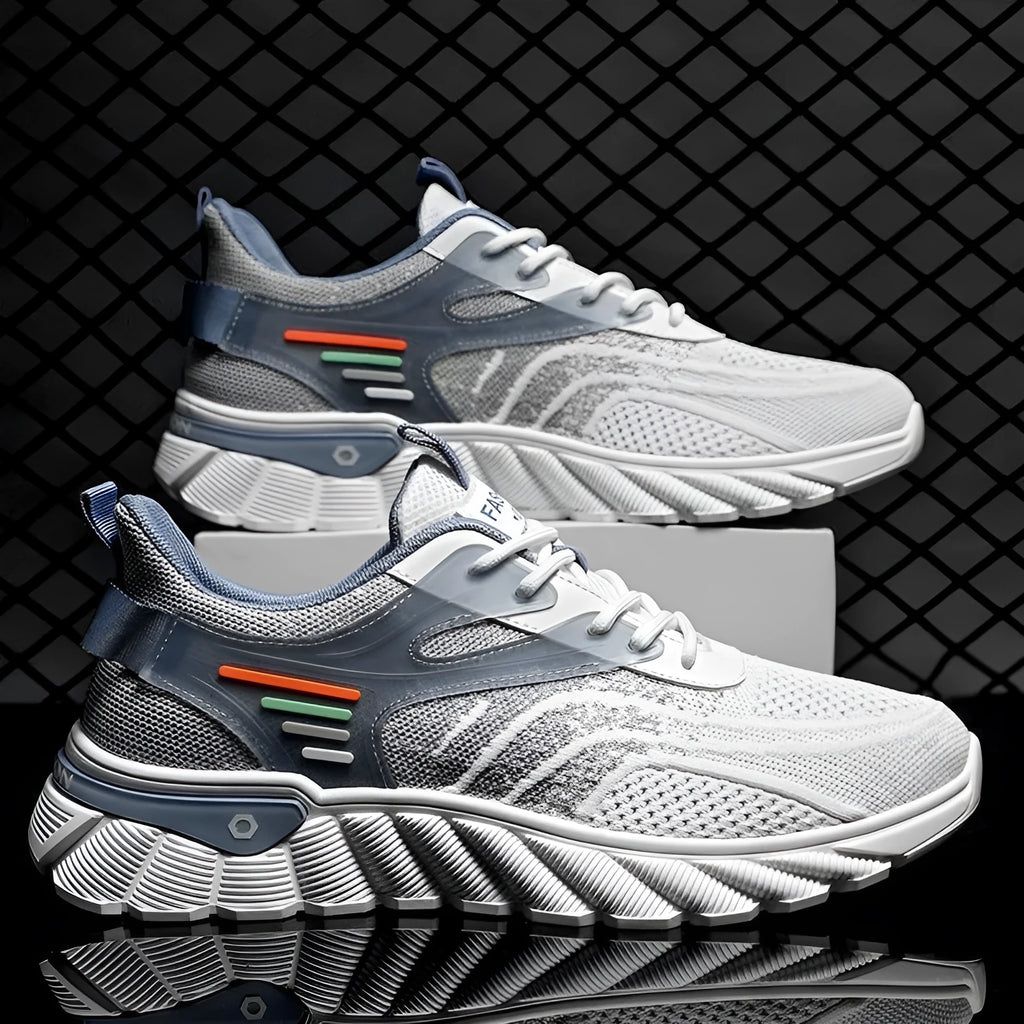 Men's white blue and black platform casual sports shoes with cross straps and mesh upper.