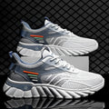 Men's white blue and black platform casual sports shoes with cross straps and mesh upper.