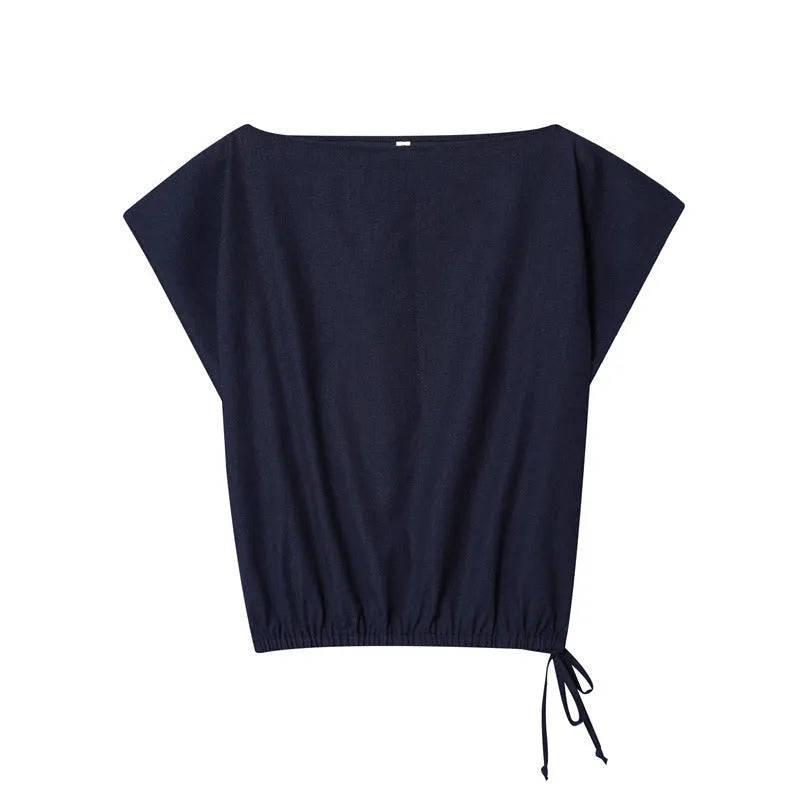 Women's linen blend co-ord set showing off-neck top with flounced sleeves and wide leg trousers.