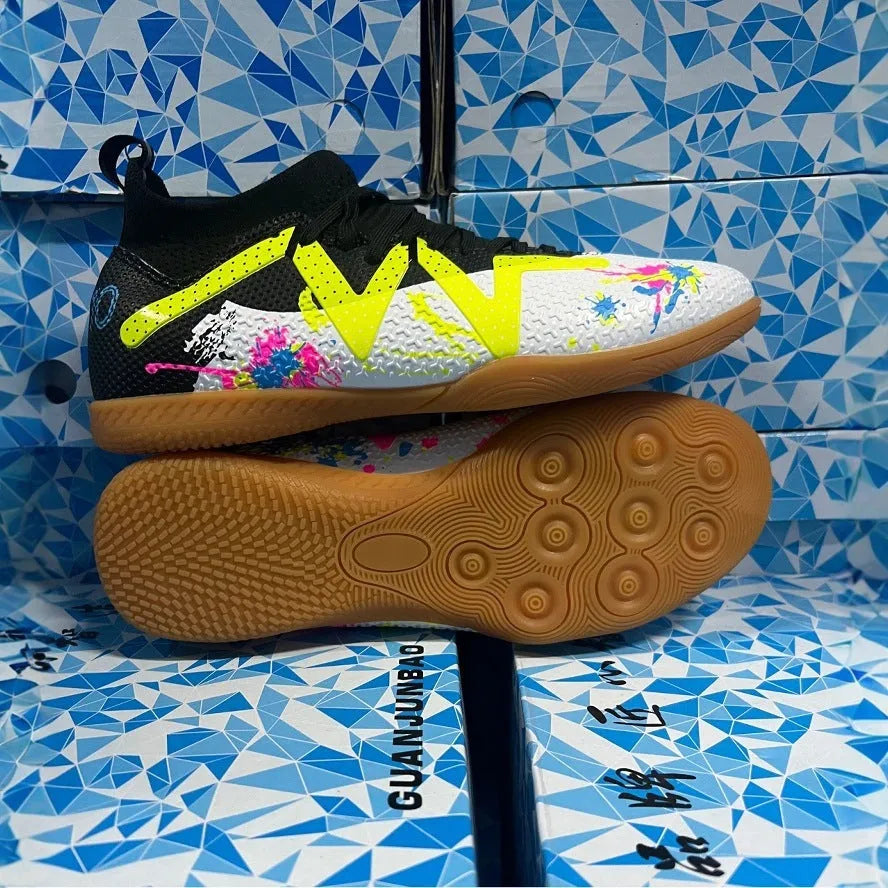 Adult low-top football boots with non-slip rubber outsole, available in black and yellow, white, and black colourways.