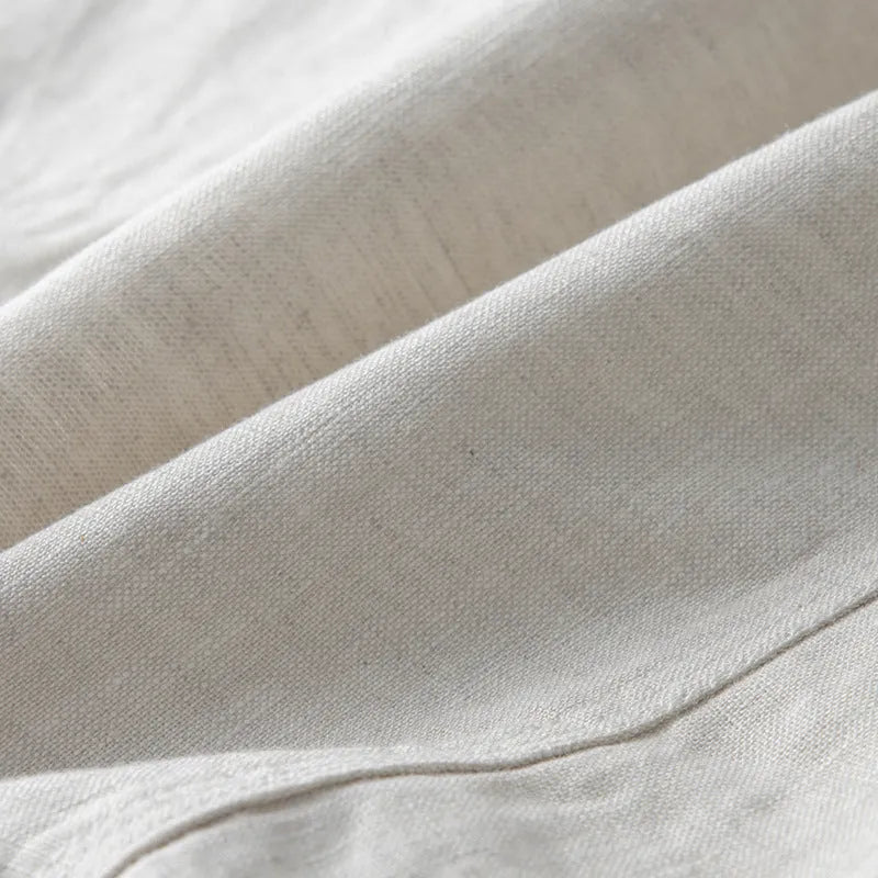 Men's loose-fit linen casual blazer jacket shown in available colours: white, black, natural linen, sky blue, and navy blue.
