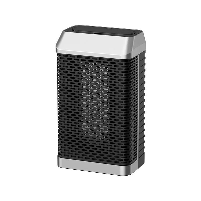 Black smart portable electric heater with remote control on a desktop.