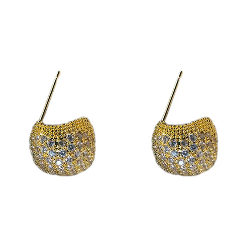 Geometric drop-shaped clip earrings with sphere elements and diamond flashing in gold or white colour