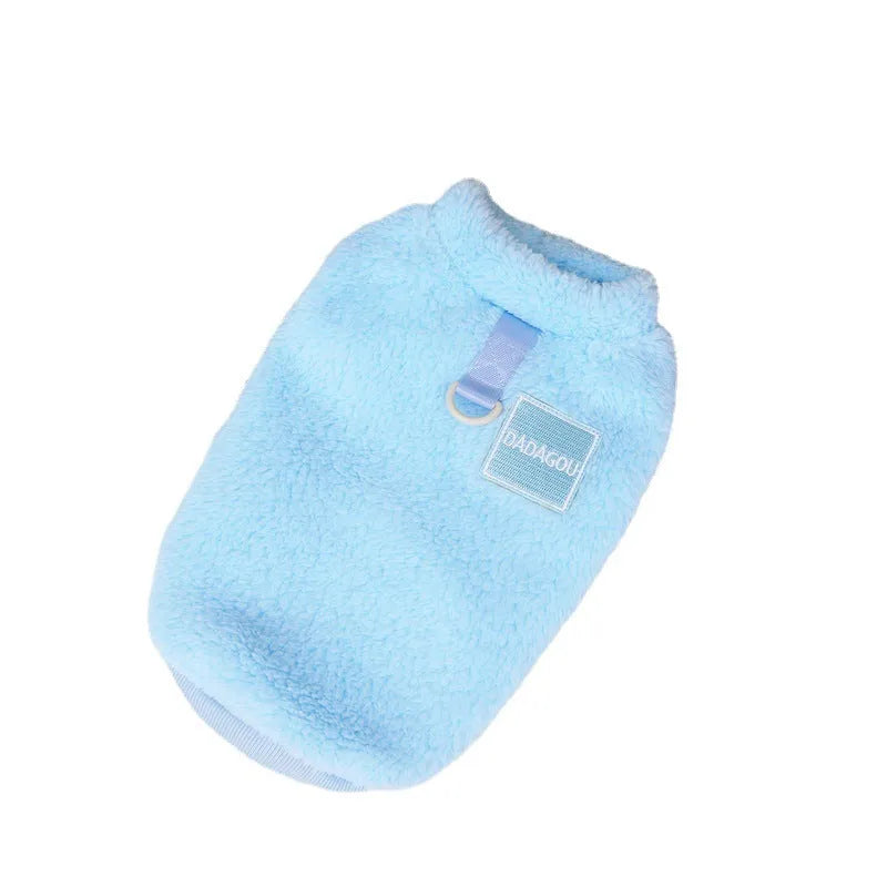 Blue coral fleece jacket for a dog, showing front leg openings and fluffy texture.