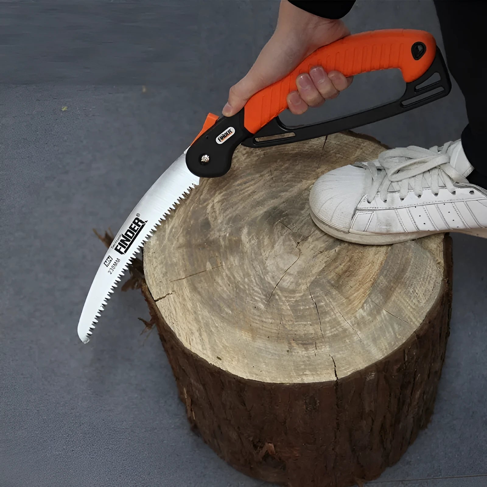 Garden folding saw with extended 230mm blade and TPR grip handle shown alongside folded configuration