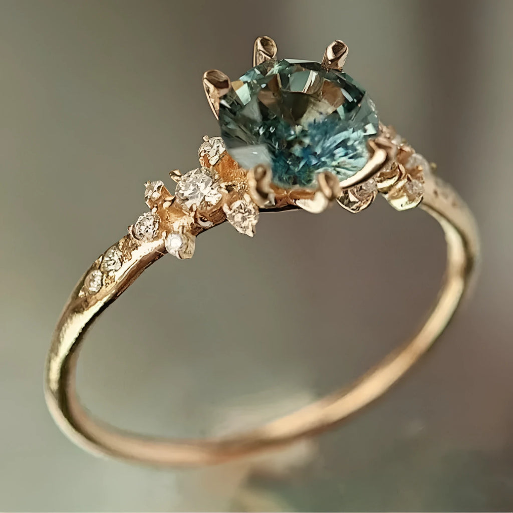 Gold-plated ring with geometric chamfered pattern and claw-set zircon stone