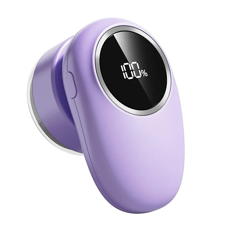 Beige and purple digital fur ball trimmer lint rollers with removable cutter heads on a table.