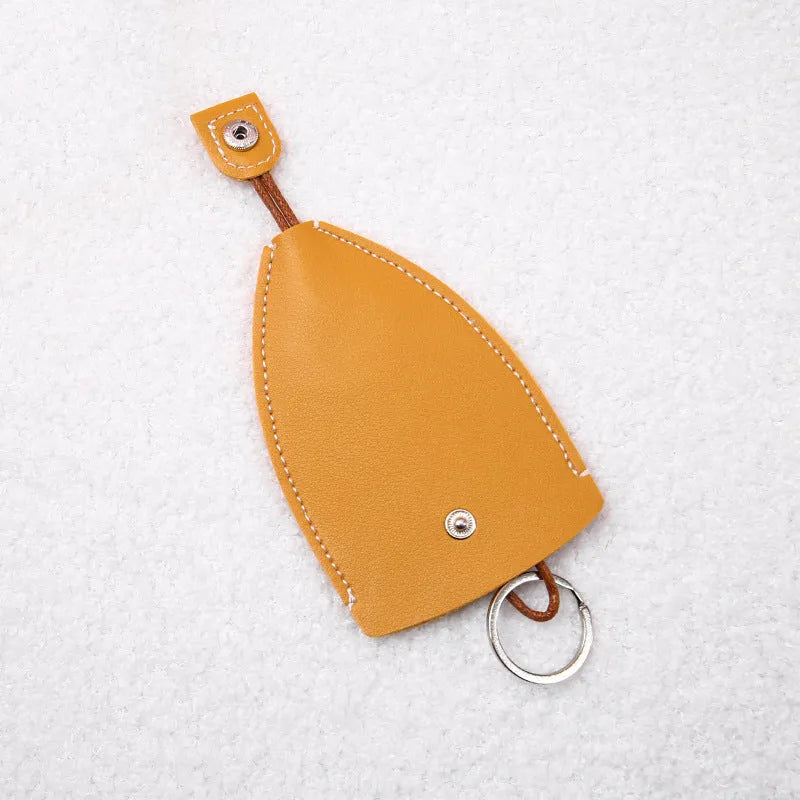 Cartoon pull-out key case in PU leather with colourful design, showing compact 14cm by 7.5cm dimensions