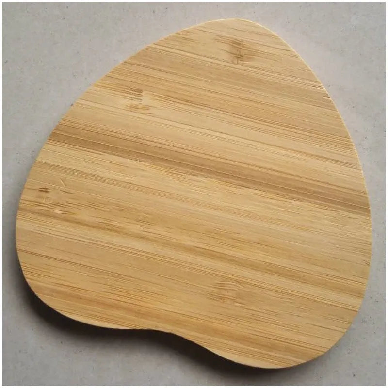 Brown wooden bamboo square 5W QI wireless charger on a desk