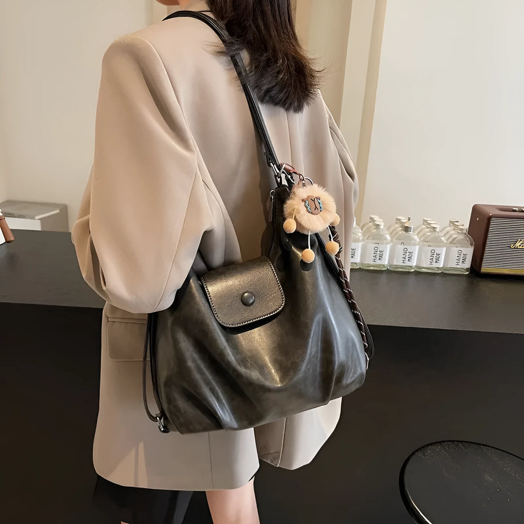 Women's black PU leather single shoulder bag with horizontal square shape and dedicated phone compartment