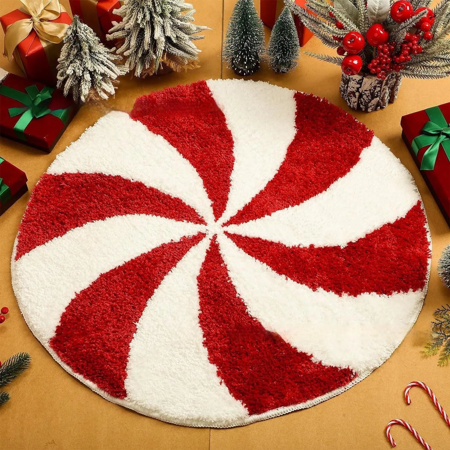 Round printed Christmas carpet on floor in festive red and green pattern.