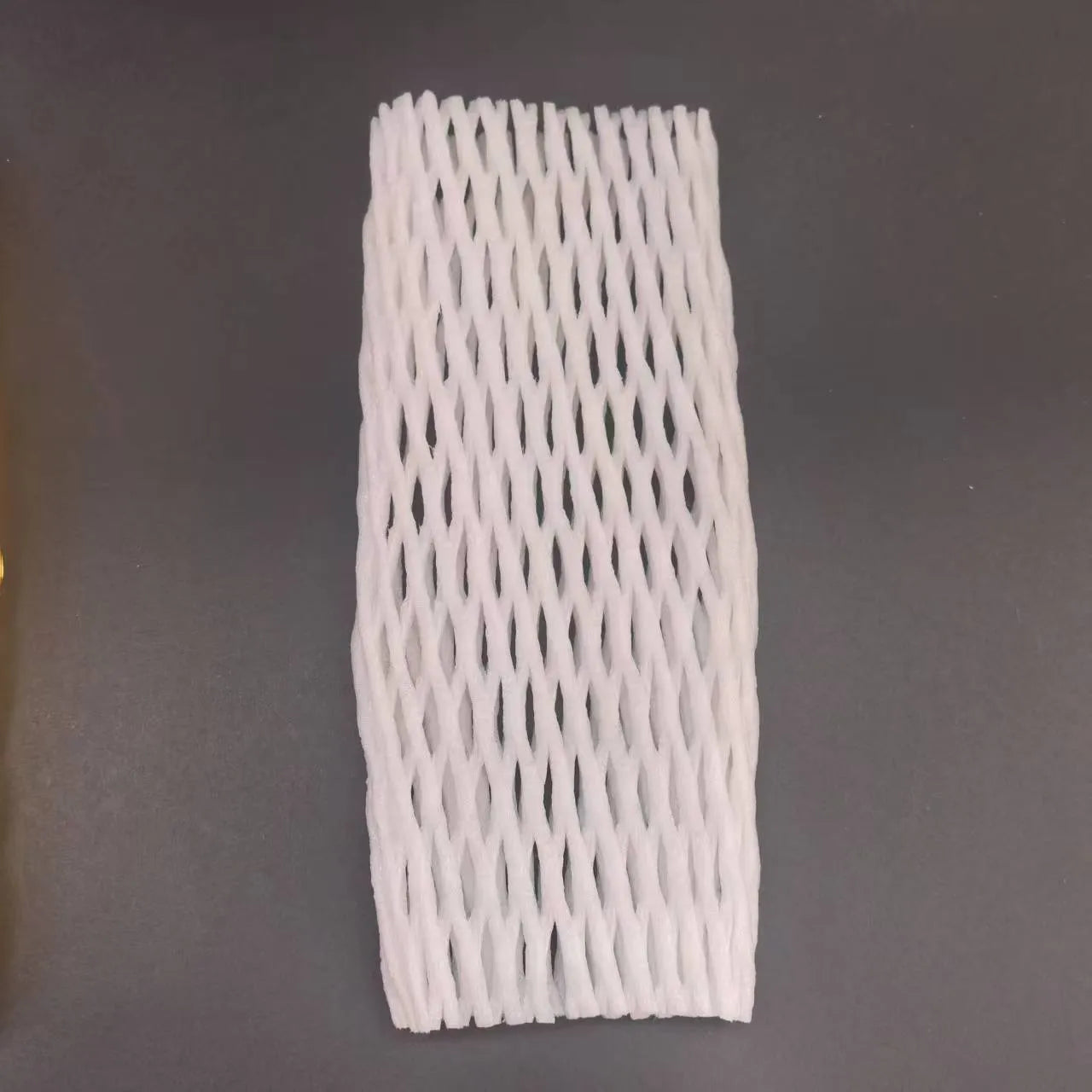 White foam net protective cover shown in various sizes for cushioning fruit and fragile items.