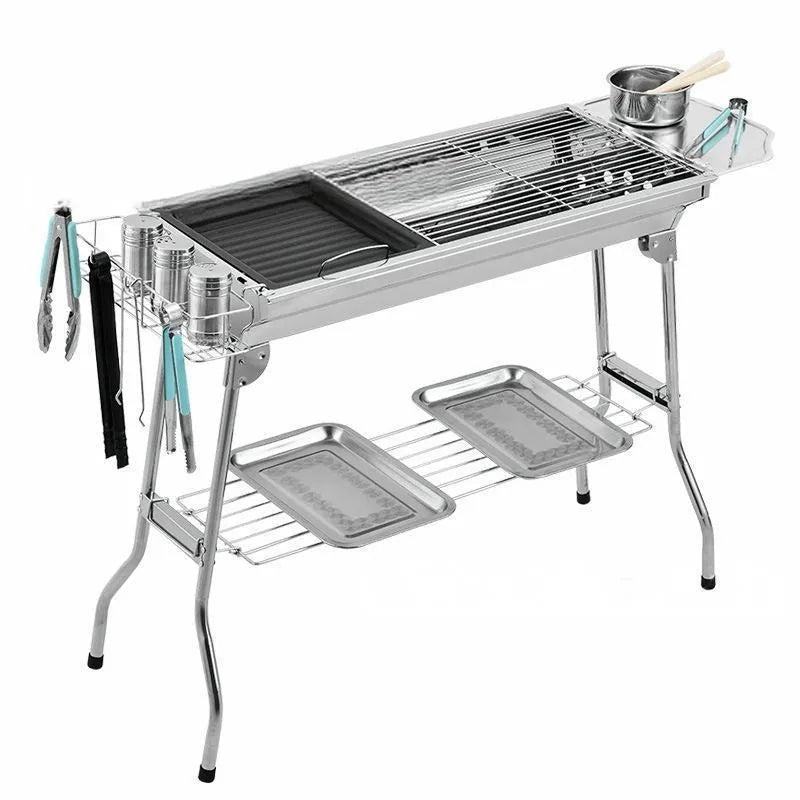 Stainless steel portable barbecue oven with charcoal stove and grilling accessories