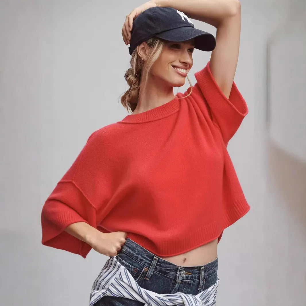 Red or white short viscose fibre T-shirt with an exposed navel cut, shown on a model.
