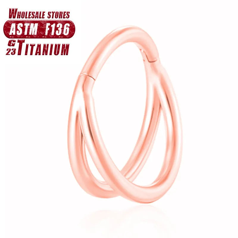 Titanium alloy fork nose ring for body piercing in silver colour on a grey background.