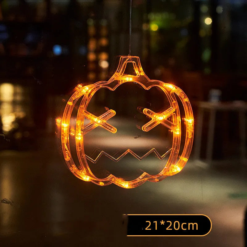 Halloween window hanging LED lights with seven designs including spider, pumpkin, ghost, and bat motifs