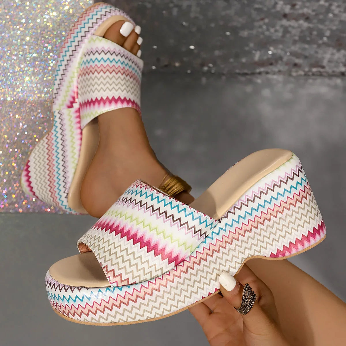 Women's beige wedge sandals with blue wave print design, fish mouth toe, and a thick rubber sole.