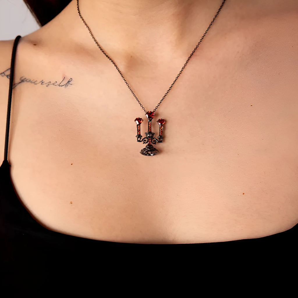 Women's retro gothic necklace with hollow candlestick pendant and cross chain in antique finish.