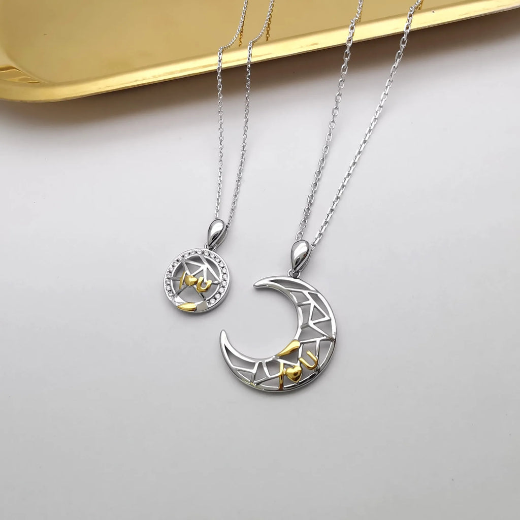 Sun and moon tooth couple necklace with copper pendant and cross chain.