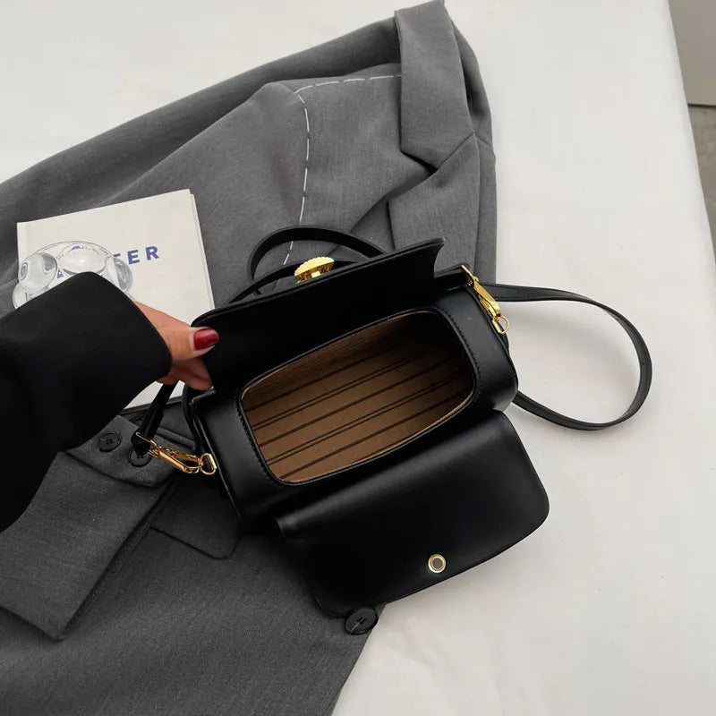 Women's personalised PU leather messenger bag in casual style with letter detailing.