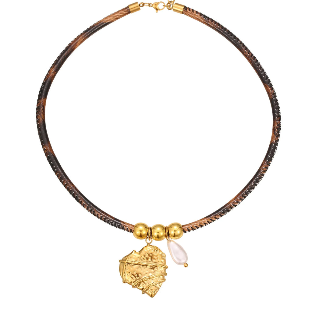 Geometric leopard pendant necklace on stainless steel chain with gold electroplated finish