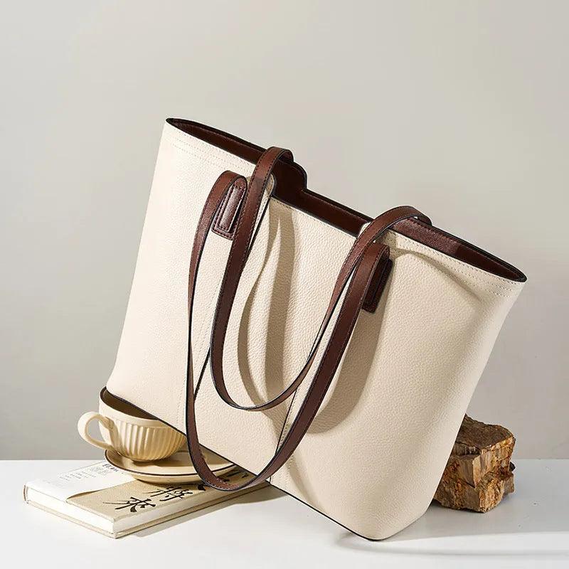 Women's genuine leather commuter shoulder bag with multiple internal zippered compartments in black colour