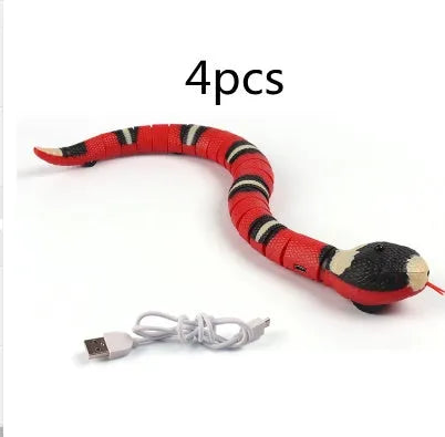 Automatic electronic snake cat toy with segmented plastic body on a floor.