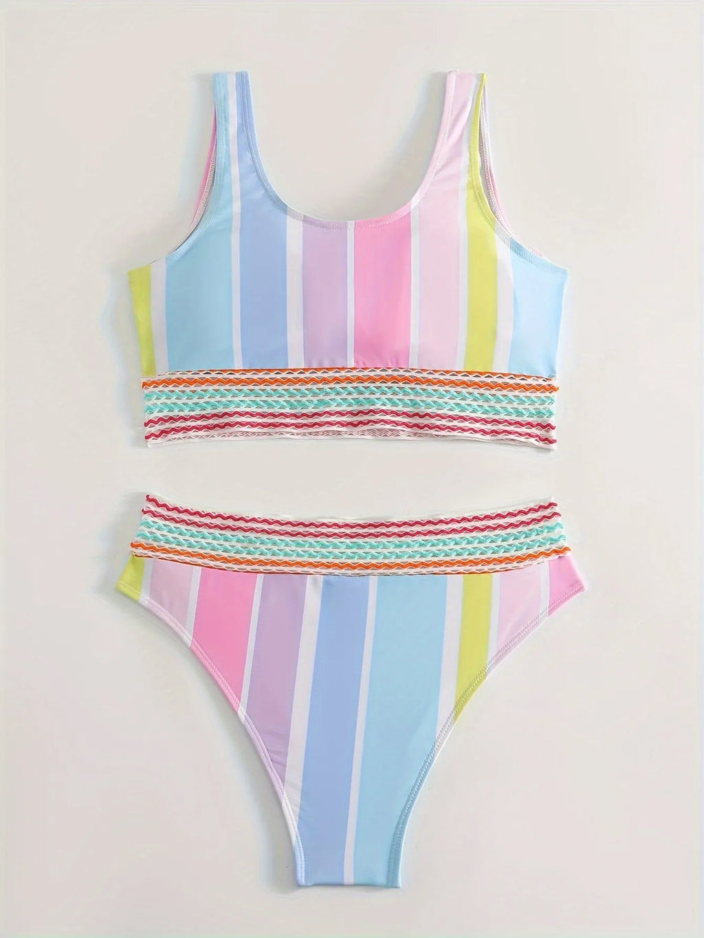 Women's striped two-piece sports bikini swimwear set on a mannequin.