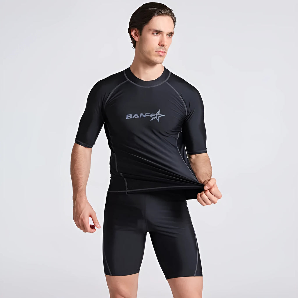 Men's navy blue half sleeve swimsuit top and pants set for swimming