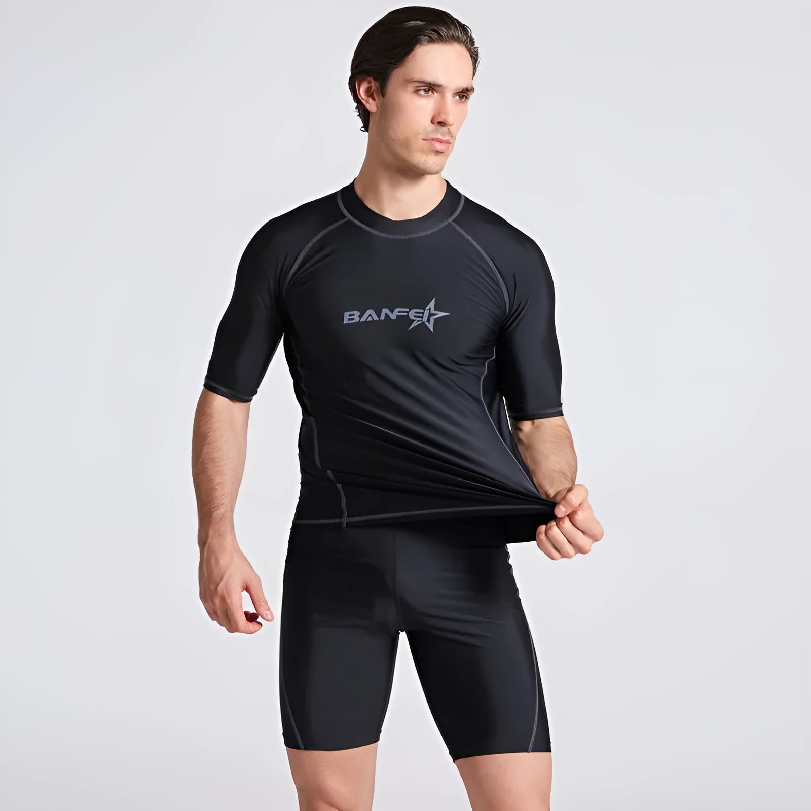 Men's navy blue half sleeve swimsuit top and pants set for swimming