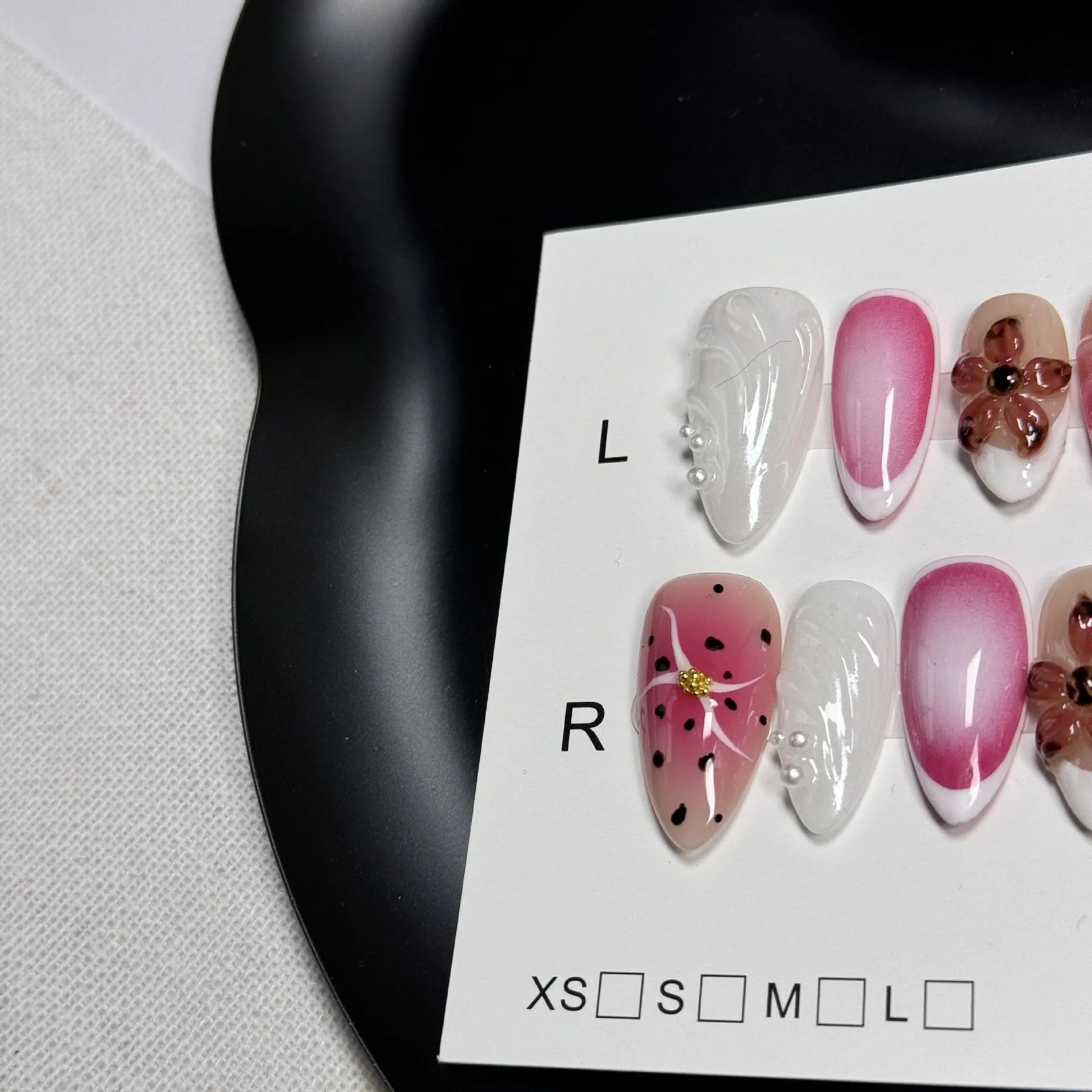 Hand-painted three-dimensional carved nail art patches in embossed candy colours, showing almond shape.