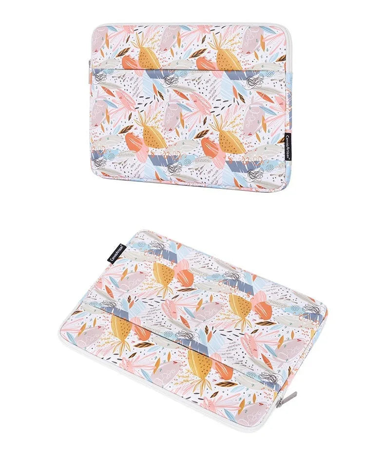 White waterproof PU leather laptop sleeve for 11 to 15 inch computers on a table.