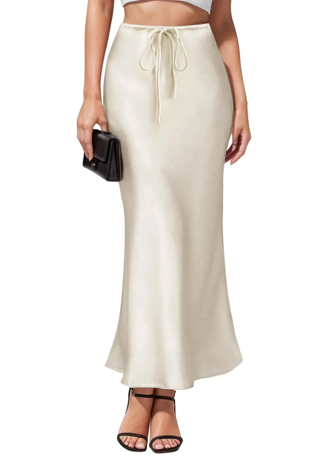 Women's high-waist asymmetric acetate skirt in black showing irregular hem detail