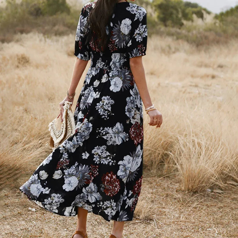 Women's floral print summer dress with V-neck, elastic waist, and large hemline skirt in yellow colour