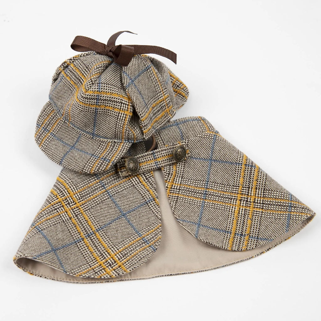 Camel-coloured personalised cotton cloak for a dog, shown with an adjustable hat.