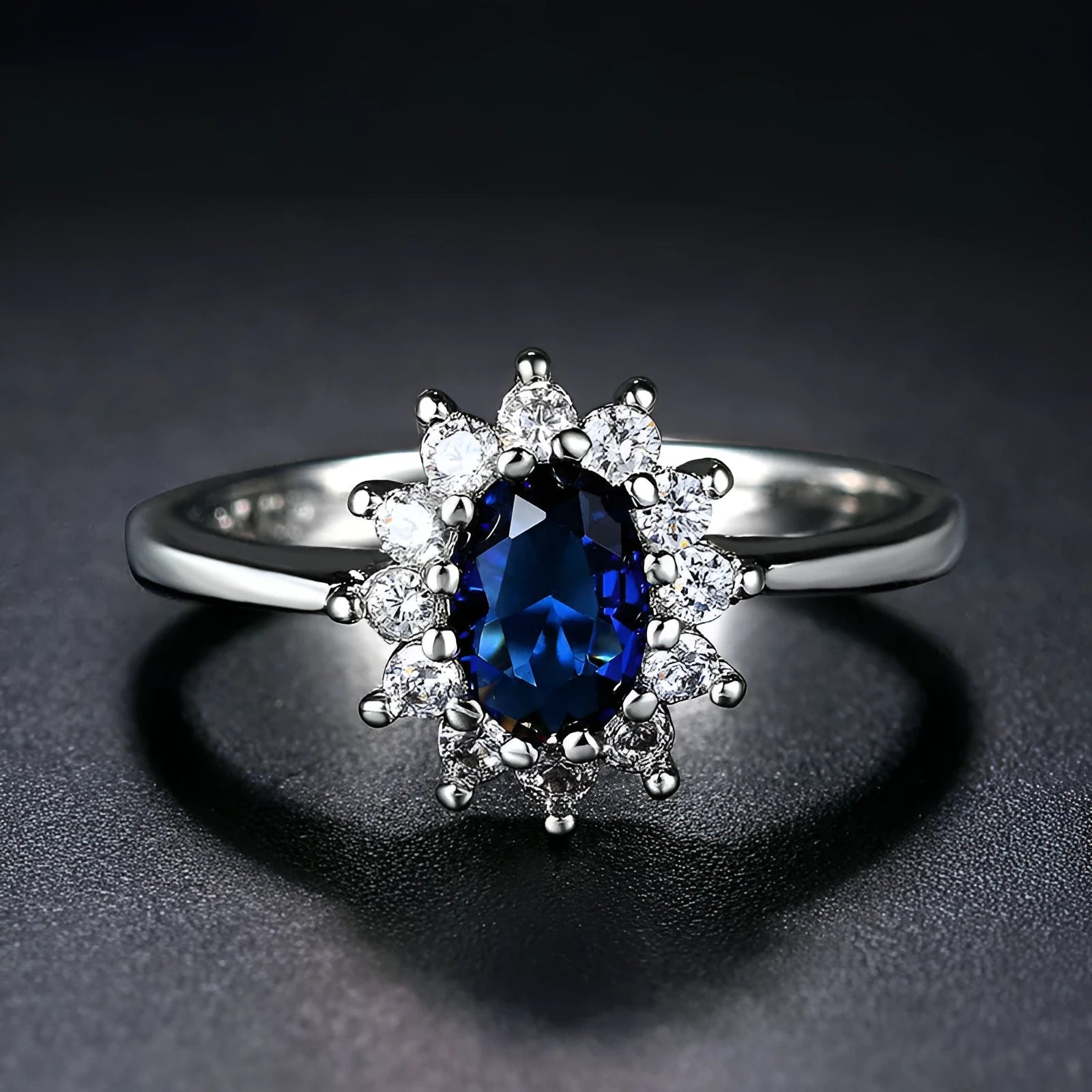 Blue moissanite women's copper ring with floral zirconium stone on a simple band, shown in three colour options.