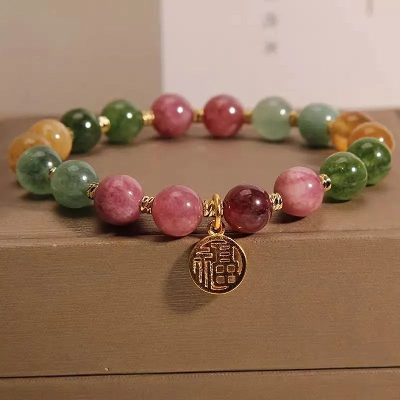 Natural colour tourmaline bracelet with electroplating in flower or fu character geometric design