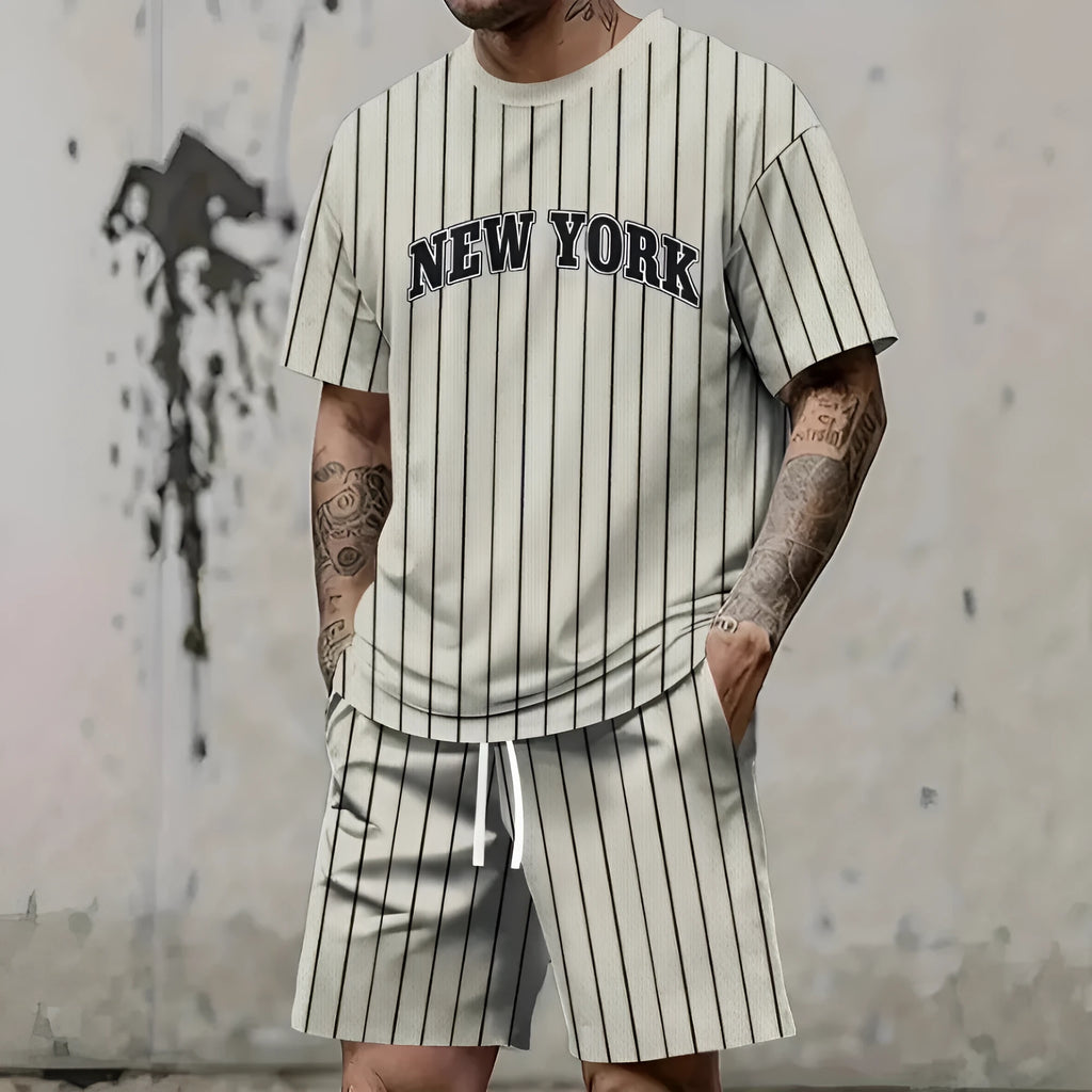 Men's grey 3D printed short sleeve top and shorts sport suit on a hanger.