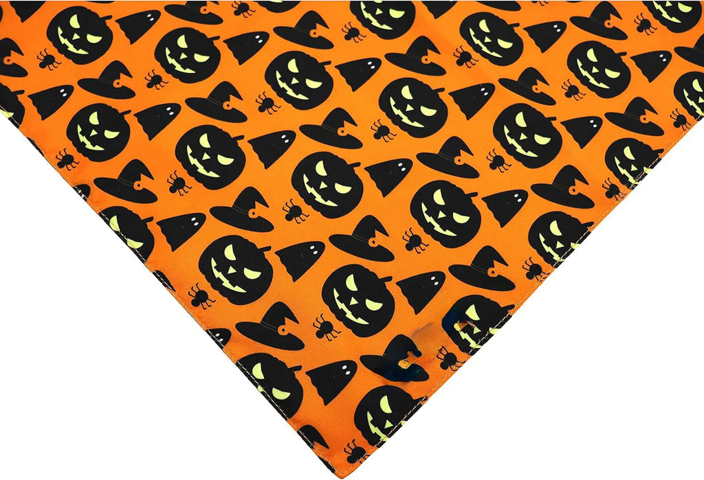 Halloween dog bandana showing reversible pumpkin and spider web patterns with adjustable neck closure
