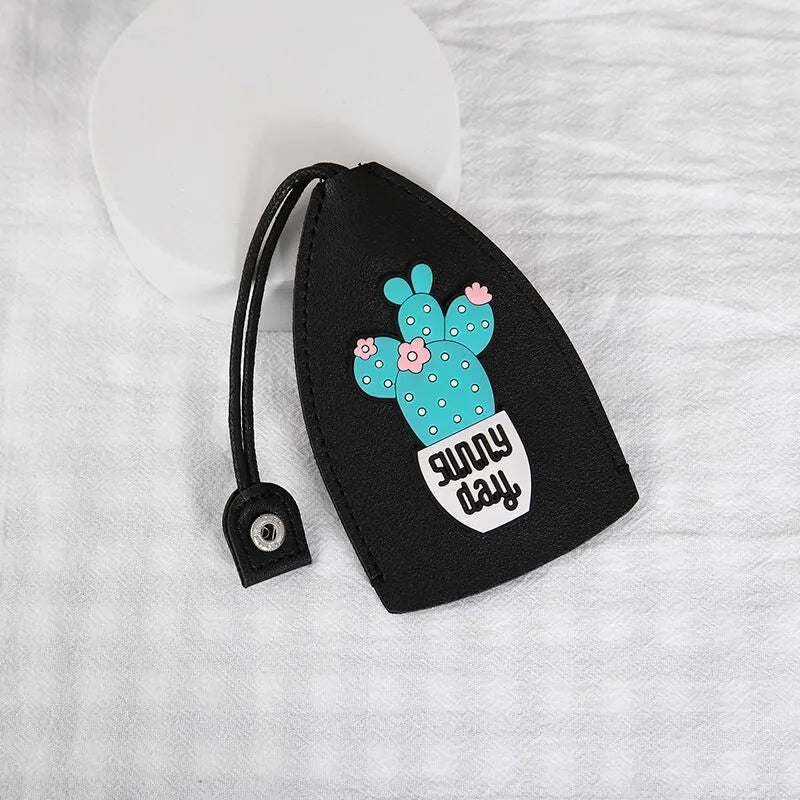 Cartoon pull-out key case in PU leather with colourful design, showing compact 14cm by 7.5cm dimensions