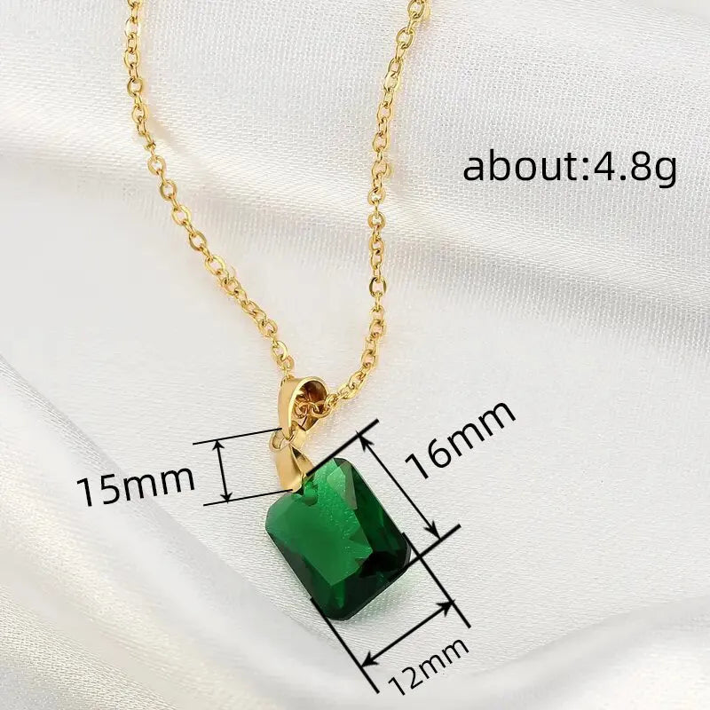 Copper geometric necklace with green rectangular quadrilateral pendant on an O-ring chain.