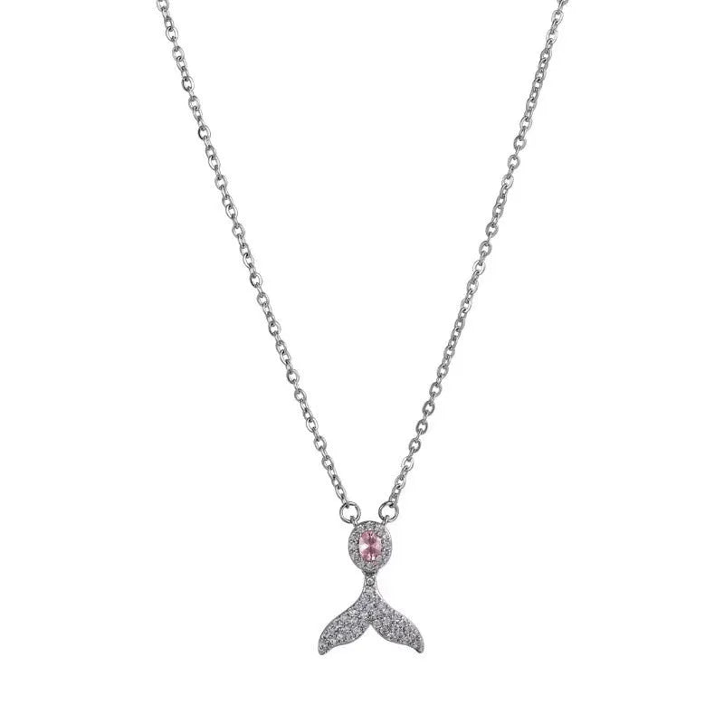 Close-up of a women's sterling silver fishtail pendant necklace on an adjustable O-ring chain.
