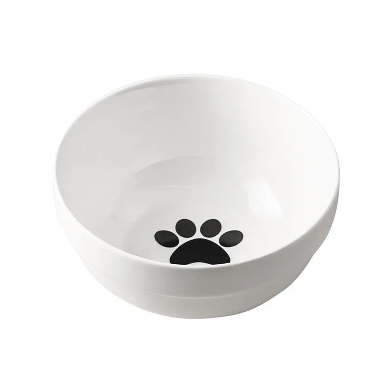 White ceramic pet bowl with cat paw print pattern in black iron frame stand