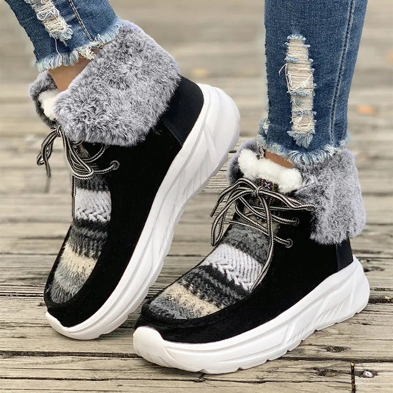 Women's lace-up snow boots with suede upper, plush lining, and platform sole