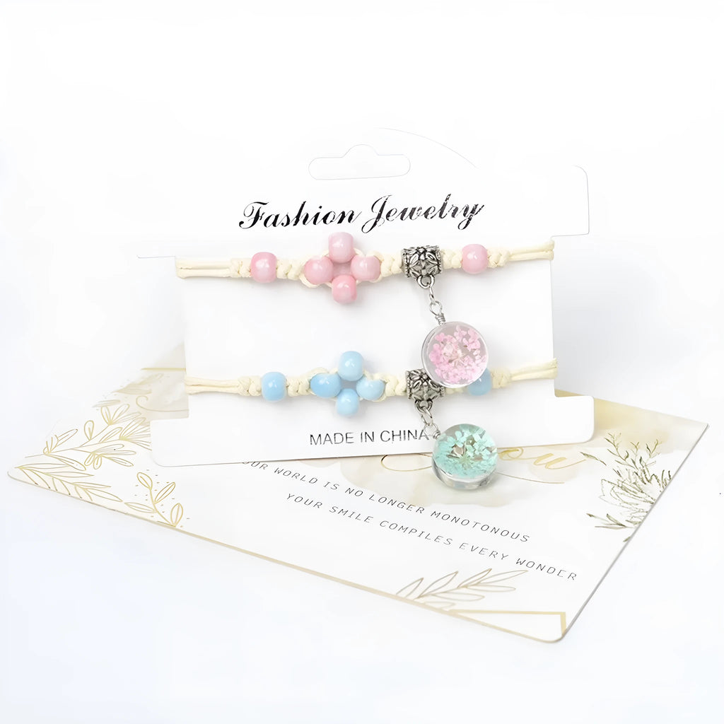 Close-up of a hand-woven glass bracelet with large 1.4 cm beads containing real dried flowers in multiple colour options.
