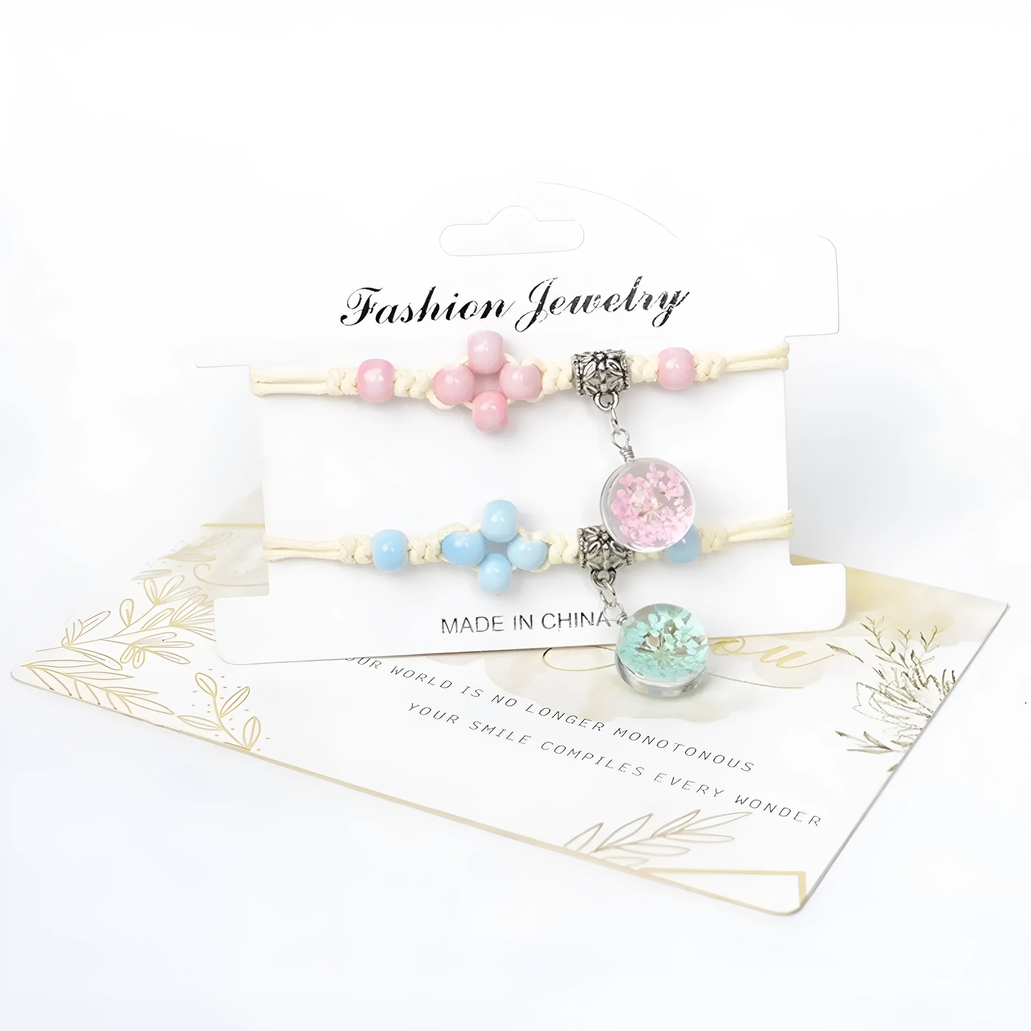 Close-up of a hand-woven glass bracelet with large 1.4 cm beads containing real dried flowers in multiple colour options.