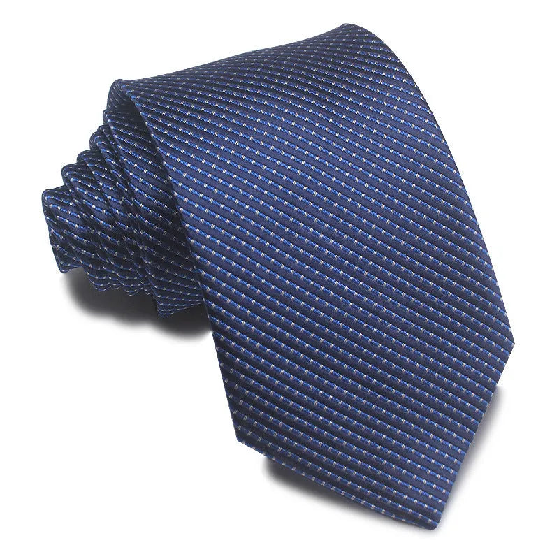 Close-up of a red, black, and blue striped men's formal tie with a textured Jacquard weave.